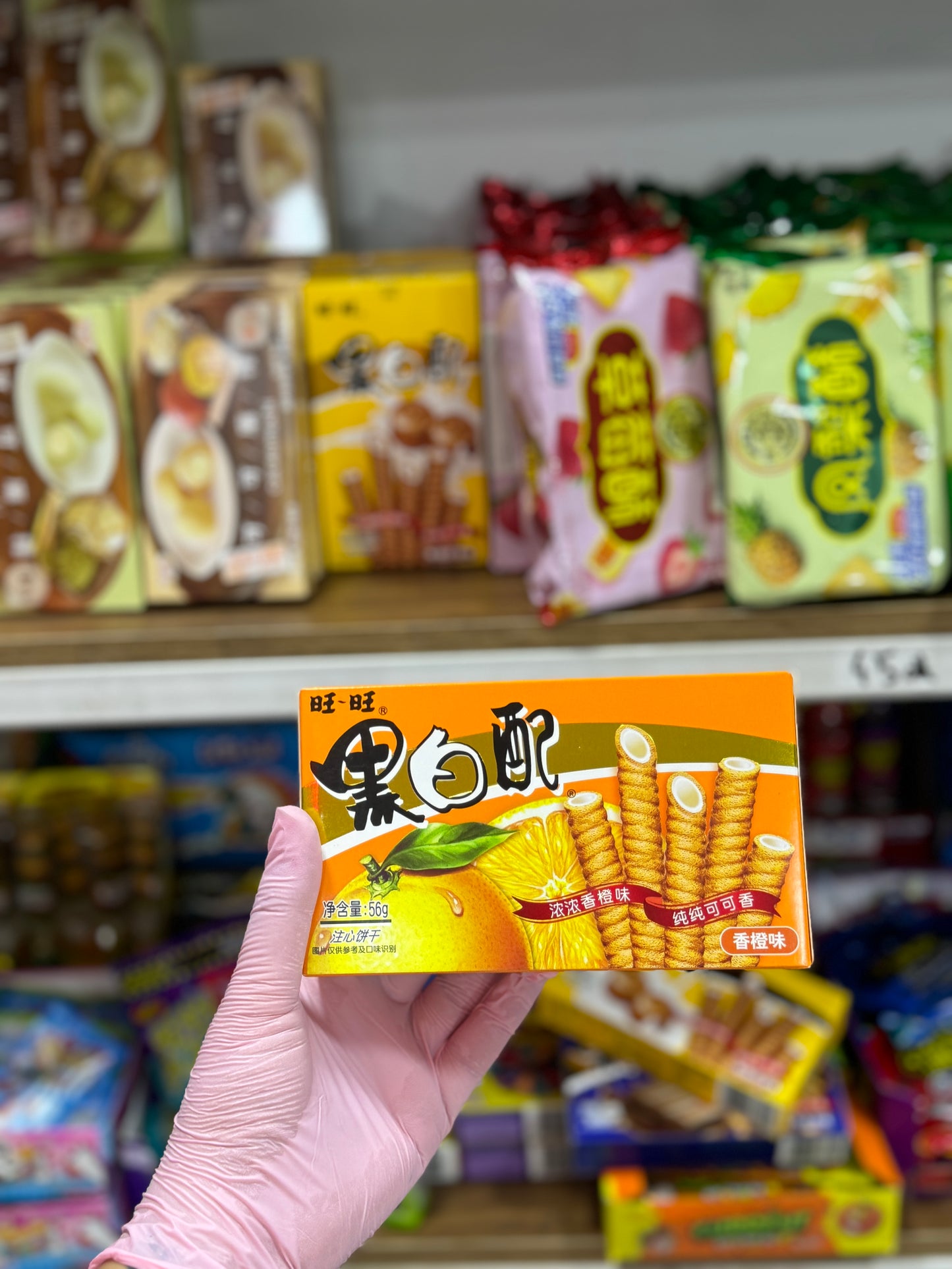WANT WANT ORANGE CREAM ROLLED WAFERS 56G - Girlzbox