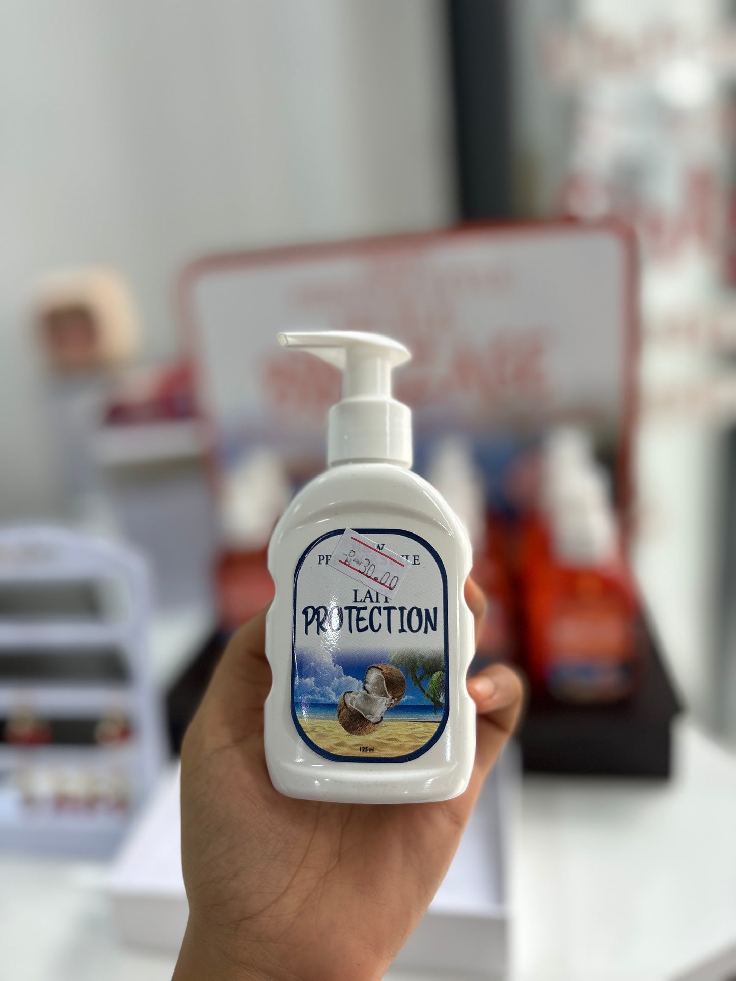 Lait de protection et de bronzage à base de huile de carotte et de coco -Girlzbox